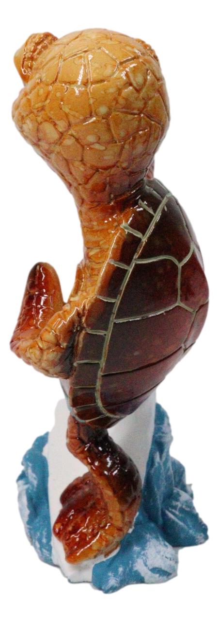 Sunkissed Surfing Turtle with Brown Shell Riding Surfboard Over Waves Figurine