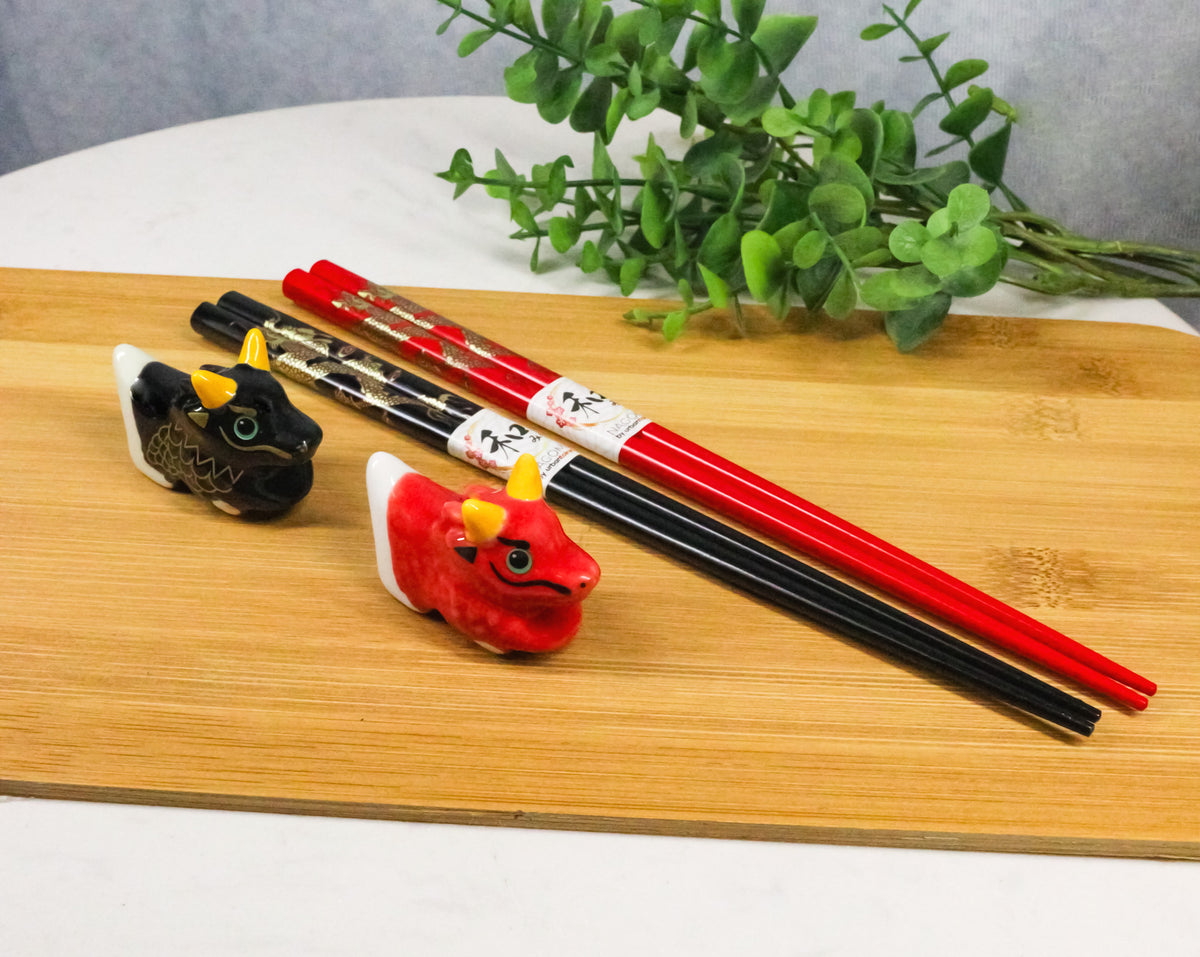Red And Black Oriental Ryu Dragons Set of 2 Chopsticks And Ceramic Rests Set
