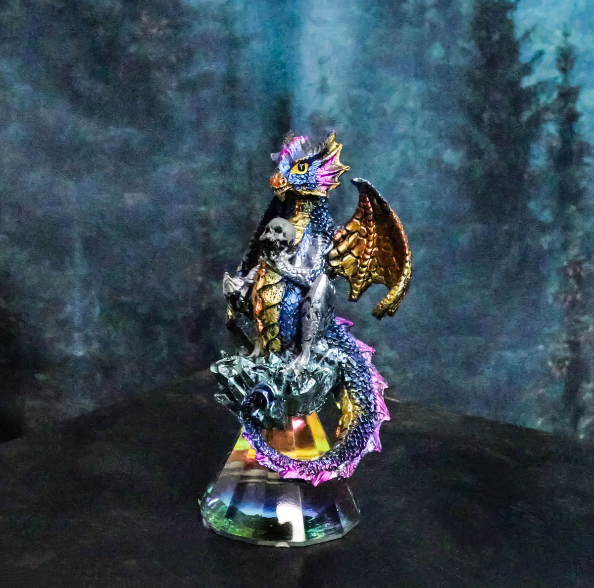 Iridescent Armored Rainbow Wyrmling Dragon Skull On Faux Crystal Prism Figurine