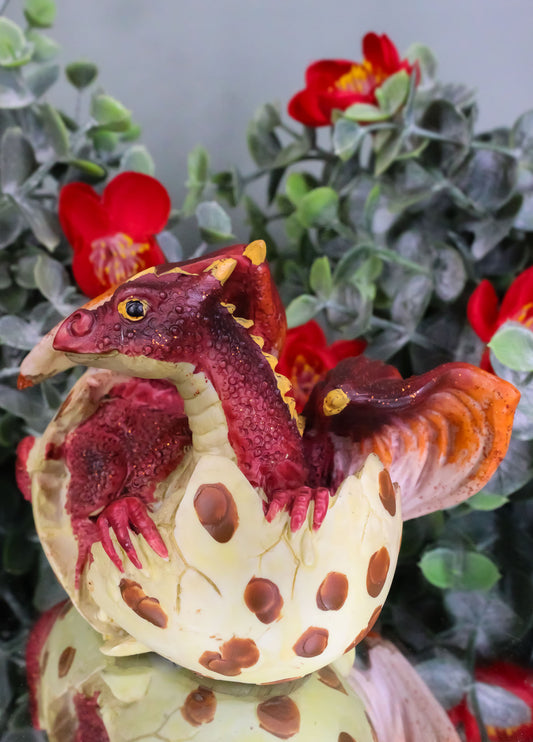 Small Sparkly Red Lava Whimsical Dragon Baby Emerging From Spotted Egg Figurine
