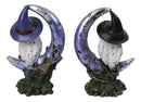 Pair of Snow Owls With Witch Hats Perching On Cratered Crescent Moon Figurines