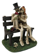 Skeleton Couple with Top Hat and Wig Sitting On Park Bench With Roses Figurine