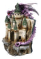 Purple Dragon Guarding LED Medieval Castle On Rocks With Book of Spells Figurine