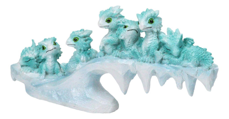 Winter Wonderland Ice Blue Baby Dragons On Frozen Bridge Glacier Rock Figurine
