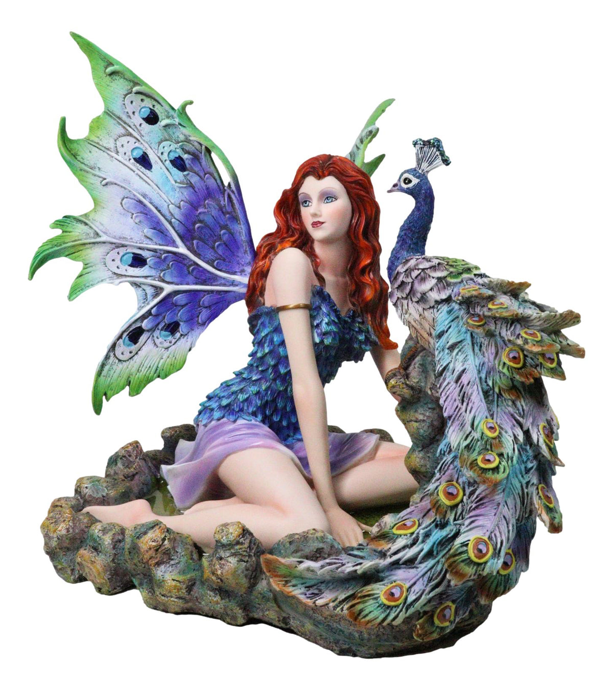 Large Fantasy Fairy With Blue Iridescent Train Wings Sitting By Peacock Statue