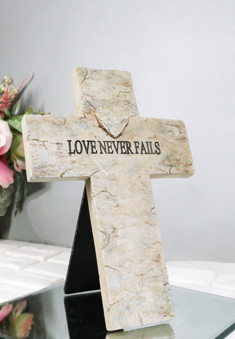 Rustic Inspirational Tuscany Vintage Love Never Fails Heart Relief Wall Cross