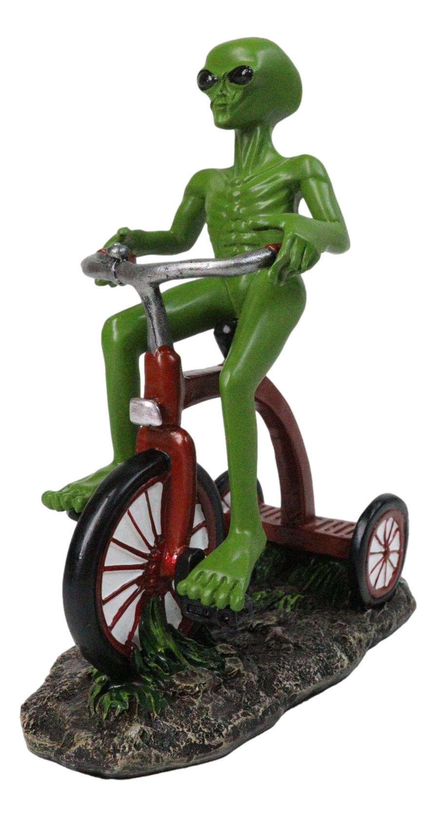 'Space Travel' UFO Green ET Roswell Alien Riding A Red Tricycle Figurine 6.75"H