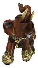 Feng Shui Faux Wood Left Facing Trunk Up Elephant With Golden Tapestry Figurine