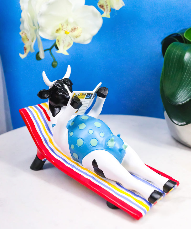 Cow Parade Ocean Beach Getaway Sunbather Cow Reading Book Collector's Figurine