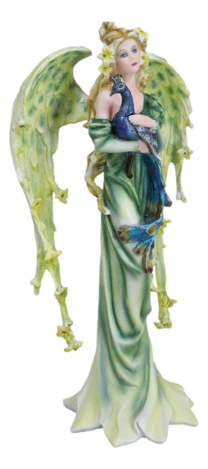 Beautiful Green Fairy With Colorful Flowers Carrying A Blue Peacock Figurine