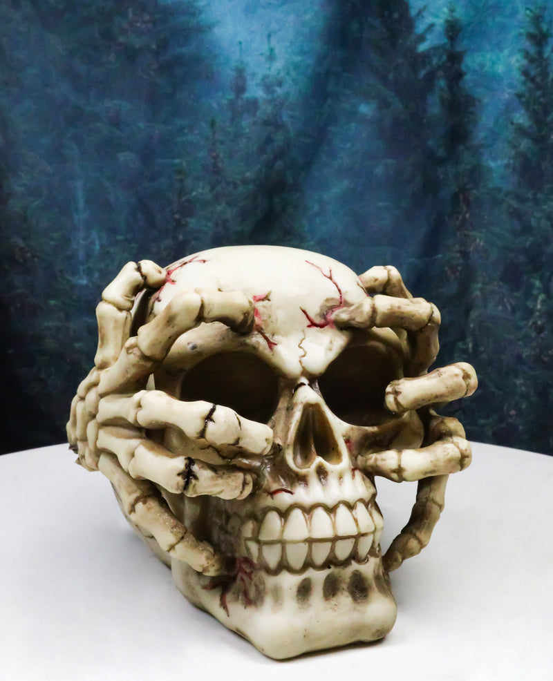 Ossuary Macabre Evil Skull With Skeleton Claws On Bloody Cranium Figurine
