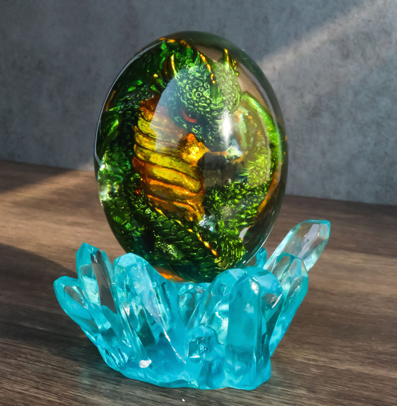 Green Fossil Dragon Hatchling Sleeping in Crystal Acrylic Glass Egg Figurine