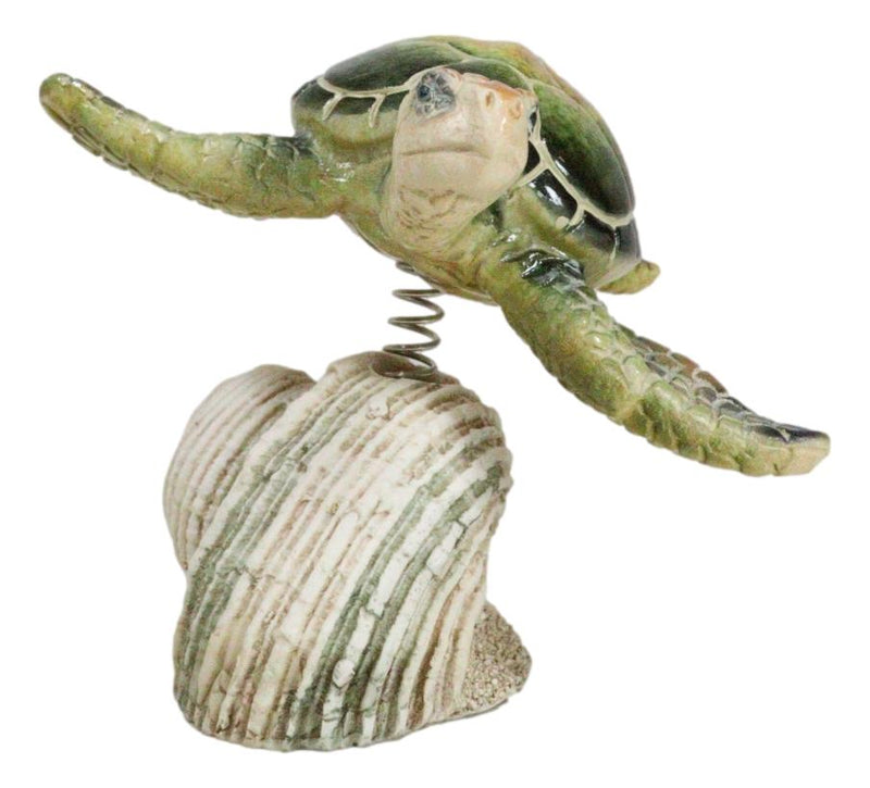 Marine Green Sea Turtle Swimming Over Partridge Tun Shell Spring Bobble Figurine