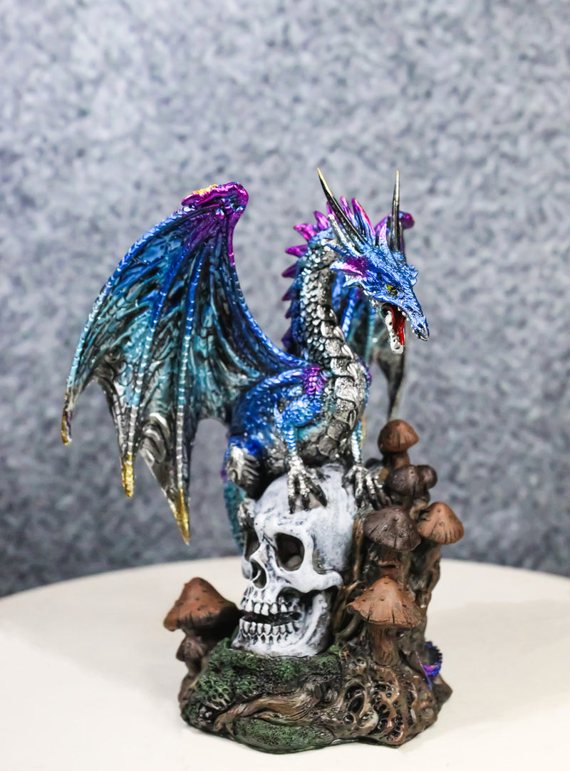 Metallic Blue Dragon with Purple Spikes Perching On Oversized Skull Figurine