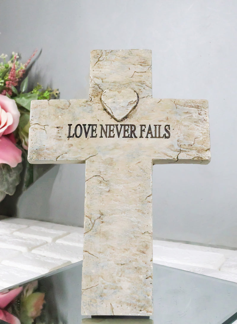 Rustic Inspirational Tuscany Vintage Love Never Fails Heart Relief Wall Cross