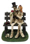 Skeleton Couple with Top Hat and Wig Sitting On Park Bench With Roses Figurine