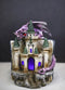 Purple Dragon Guarding LED Medieval Castle On Rocks With Book of Spells Figurine