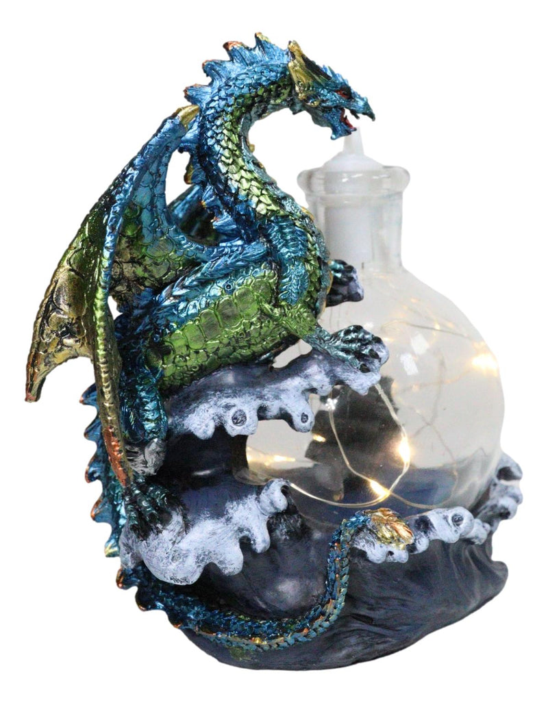 Metallic Sea Dragon Rising Above Waves by LED Glass Bottle With Ship Figurine