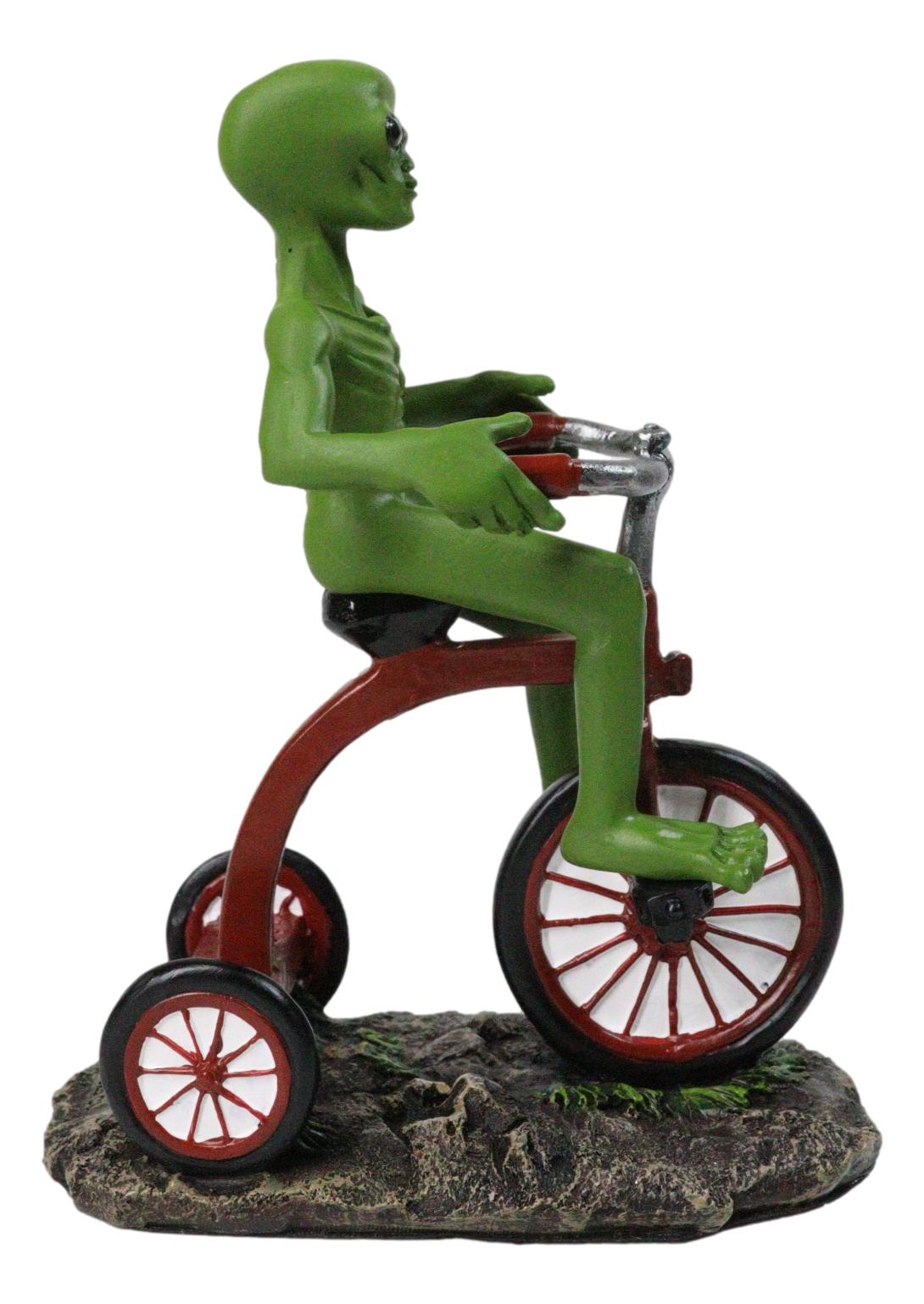 'Space Travel' UFO Green ET Roswell Alien Riding A Red Tricycle Figurine 6.75"H