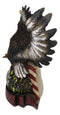 American Bald Eagle With Olive Branch Soaring by US Flag Desktop Figurine