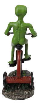 'Space Travel' UFO Green ET Roswell Alien Riding A Red Tricycle Figurine 6.75"H