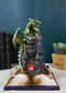 Medieval Green Dragon Perching On LED Castle With Book of Spells Figurine