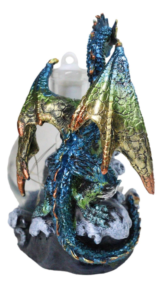 Metallic Frozen Sea Dragon Rising Above Waves by Glass Bottle With Ship Figurine