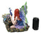 Large Fantasy Fairy With Blue Iridescent Train Wings Sitting By Peacock Statue