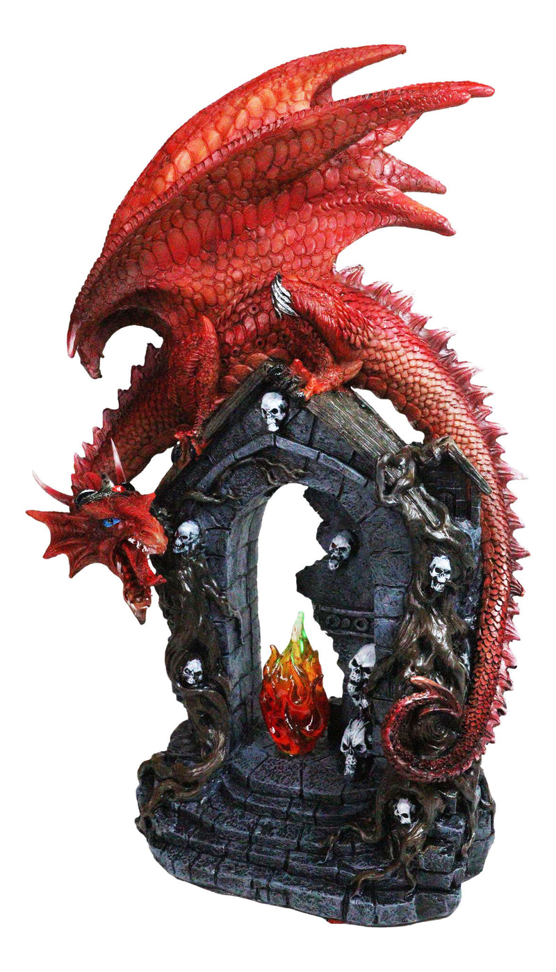 Medieval Red Dragon On Gothic Cathedric Tomb With Skulls LED Fire Flame Figurine