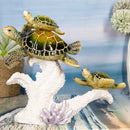 Marine Sea Turtle Mother And Hatchlings Swimming Over Ocean Reef Corals Statue