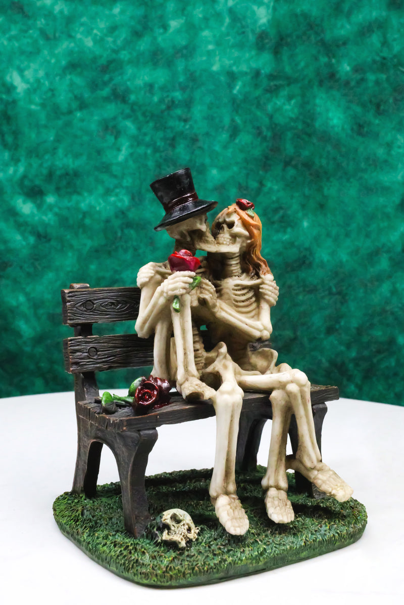 Skeleton Couple with Top Hat and Wig Sitting On Park Bench With Roses Figurine