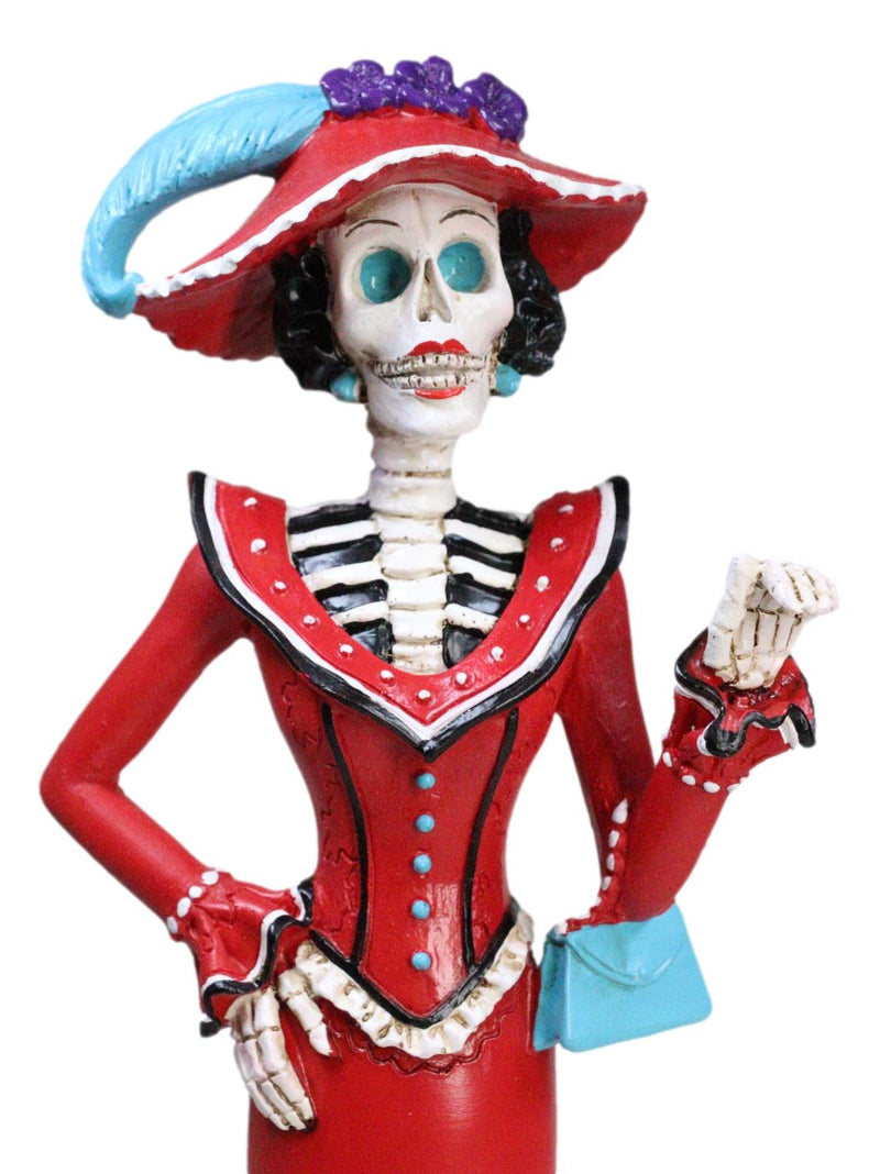 Red Dressed Fashionista Senorita Skeleton Lady Rosa With Blue Handbag Figurine