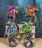 Set Of 4 Metallic Colorful Dragons Perching On Evil Eye Drake Towers Figurines