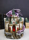 Purple Dragon Guarding LED Medieval Castle On Rocks With Book of Spells Figurine
