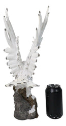 Large White Snowy Owl Figurine with Outstretched Wings on Snow-Covered Branch