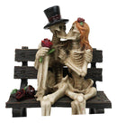 Skeleton Couple with Top Hat and Wig Sitting On Park Bench With Roses Figurine