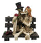 Skeleton Couple with Top Hat and Wig Sitting On Park Bench With Roses Figurine