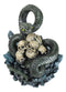 Coiled Attacking Snake On Mound of Skulls at Crystal Rock Quarry Figurine