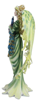 Beautiful Green Fairy With Colorful Flowers Carrying A Blue Peacock Figurine