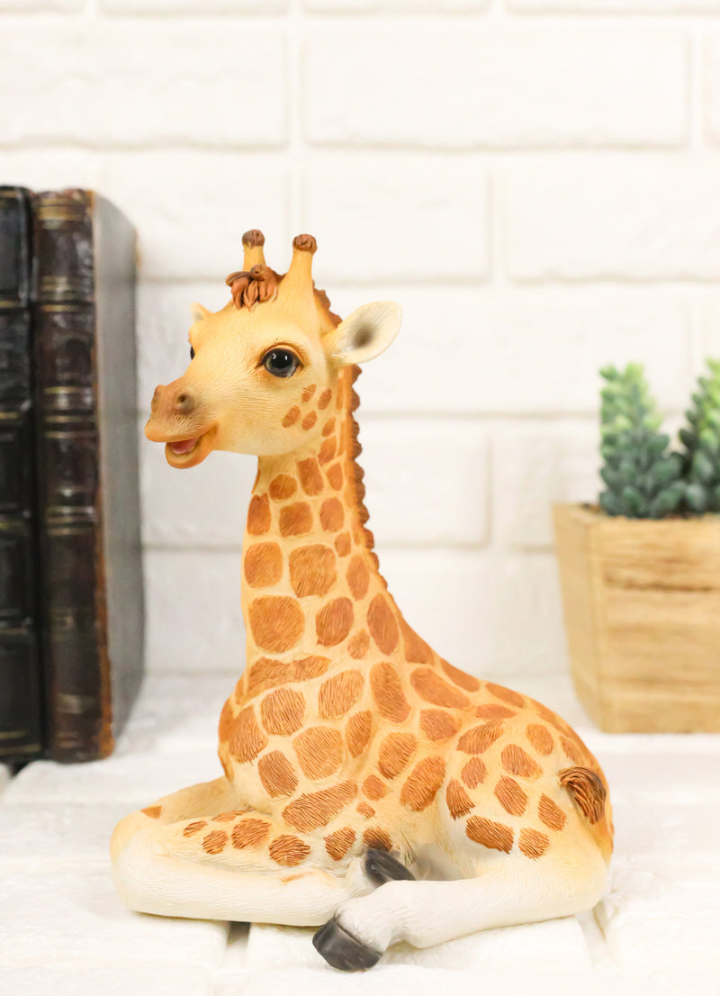 Wildlife Safari Savannah Masai Giraffe Calf Sitting in Repose Figurine 5.75"H