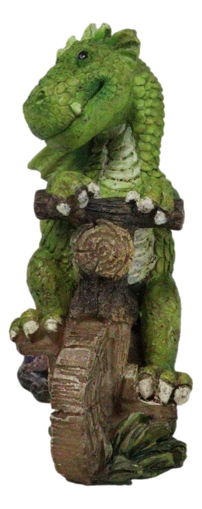 Fantasy Green Wyrmling Baby Dragon Riding A Wooden Log Cavebike Bicycle Figurine