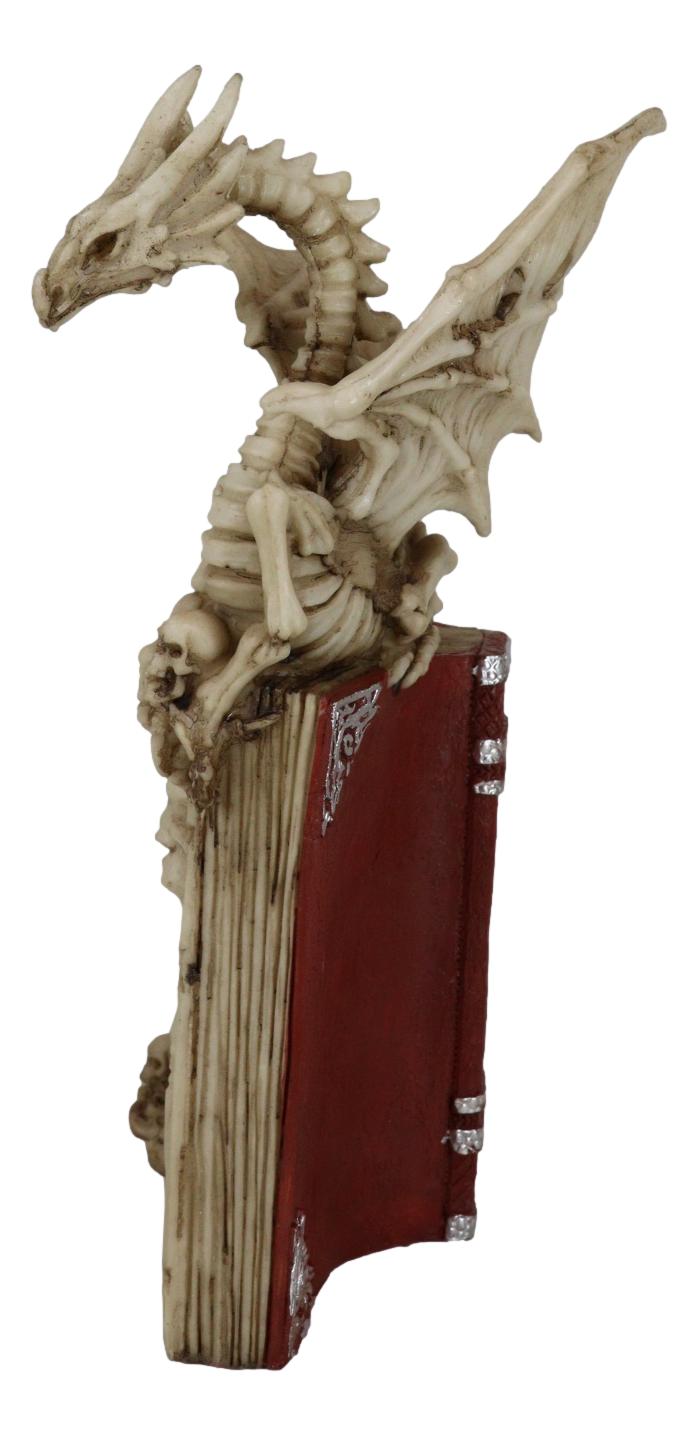 Gothic Skeleton Dragon On Spell Book Of The Dead Skulls And Bone Hands Figurine