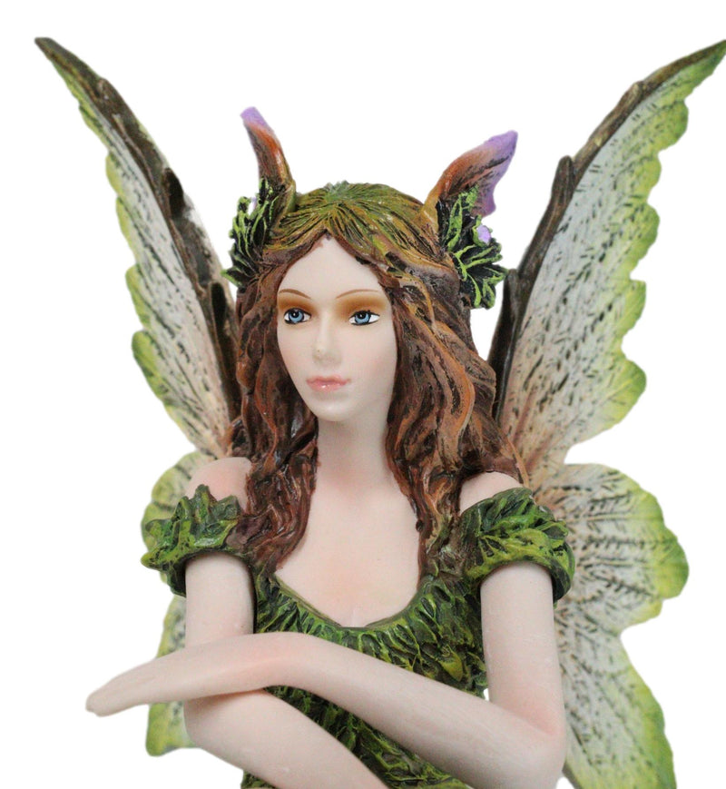 Sitting Pretty Tribal Elf Pixie Earth Fairy in Green Foliage Dress Fig Ebros Gift Sitting Pretty Tribal Elf Pixie Earth Fairy in Green Foliage Dress Fig Ebros Gift