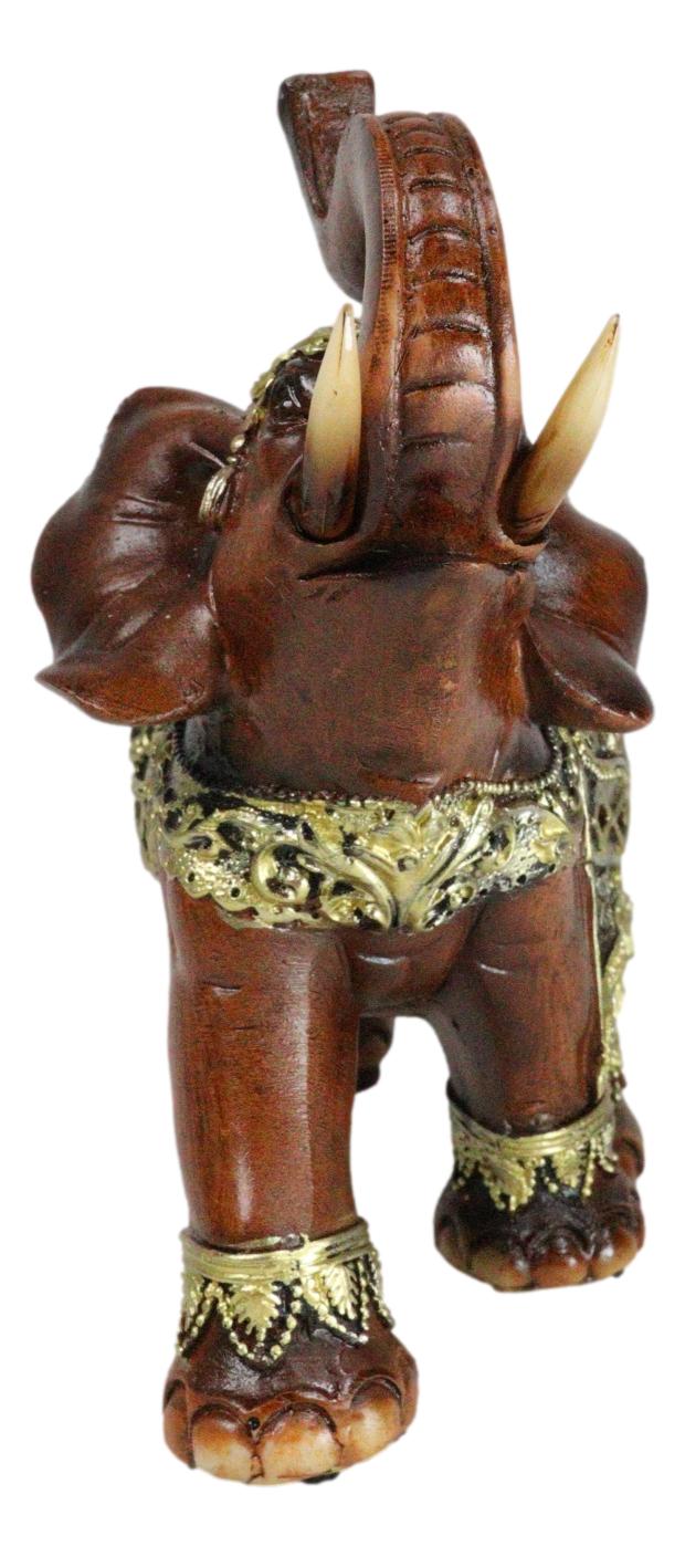 Faux Wood Trunk Up Elephant With Golden Scrollwork And Glass Mirrors Figurine