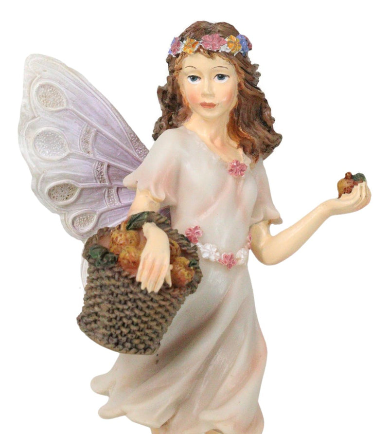 Enchanted Garden Butterfly Fairy With Floral Laurel And Apple Basket Figurine