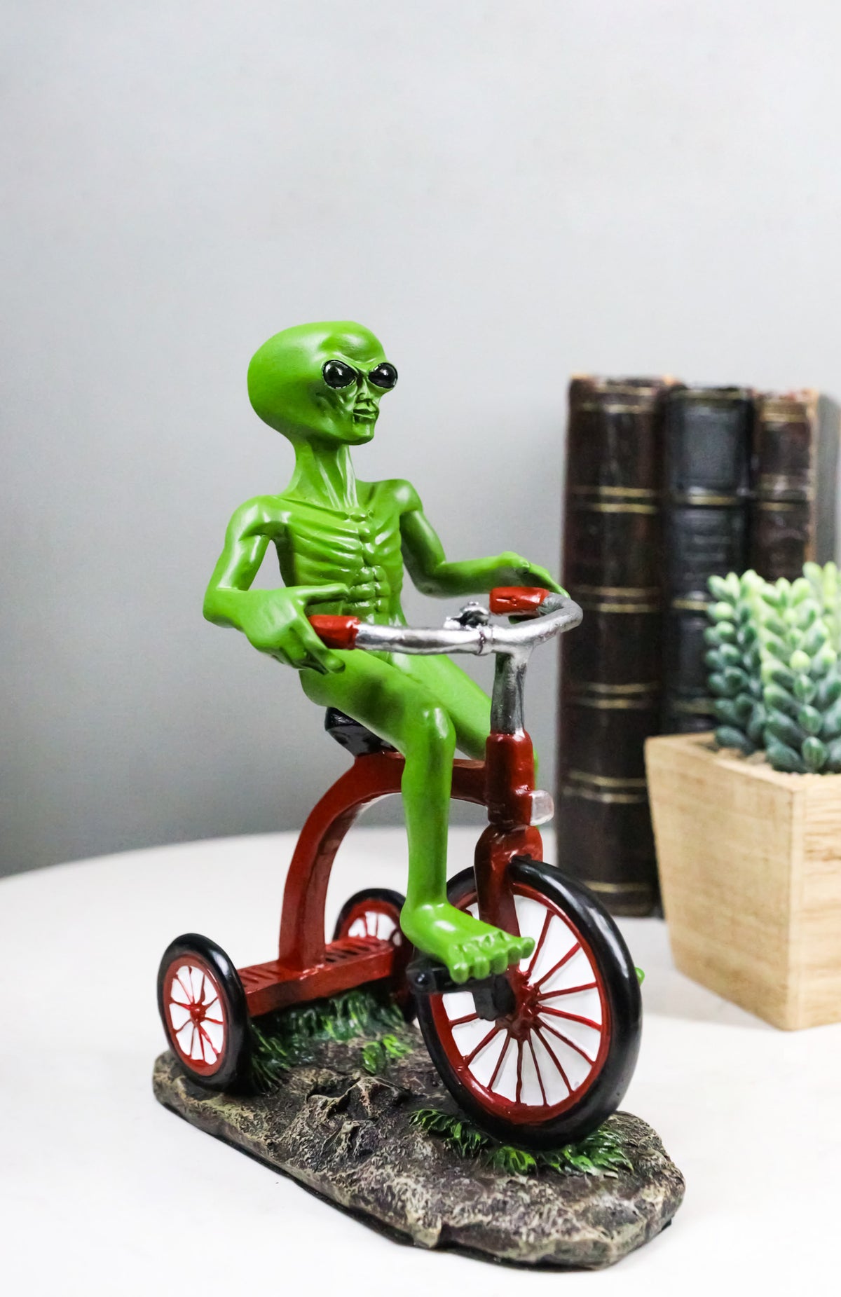 'Space Travel' UFO Green ET Roswell Alien Riding A Red Tricycle Figurine 6.75"H