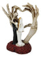 Love Never Dies Skeleton Bride & Groom With Skeletal Hands Wedding Arch Figurine