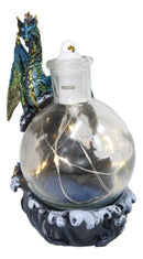Metallic Sea Dragon Rising Above Waves by LED Glass Bottle With Ship Figurine