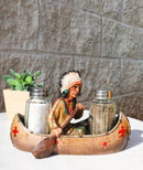 Native American Indian Chief In Canoe Boat Salt and Pepper Shaker Holder Set