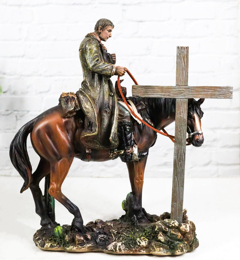 Western Cowboy in Solemn Prayer On Horse By Faded Cross And Cactus Figurine